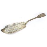 A Victorian silver fiddle pattern fish slice, with engraved blade and monogram to handle, London