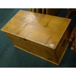 A pine blanket box, with metal side handles, 83cm wide.