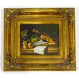 G Larson? Still life with a violin, recorder and fruit, oil on board, 19cm x 24cm.