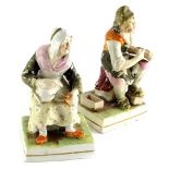A pair of 19thC Staffordshire figures of cobblers, each polychrome decorated on square gilt line