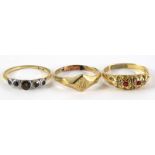 Three rings, a 9ct gold ruby gypsy ring, 2.5g all in, an 18ct illusion set ring, 1.4g all in, and