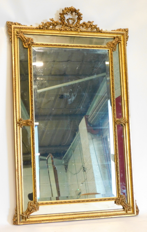 WITHDRAWN PRE SALE BY VENDOR. A continental gilt gesso wall or overmantel mirror, the moulded