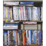 A quantity of DVDs. (2 shelves)