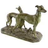 After J. Merculiano. Two greyhounds, bronze with verdigris finish, 40cm high, 60cm wide.