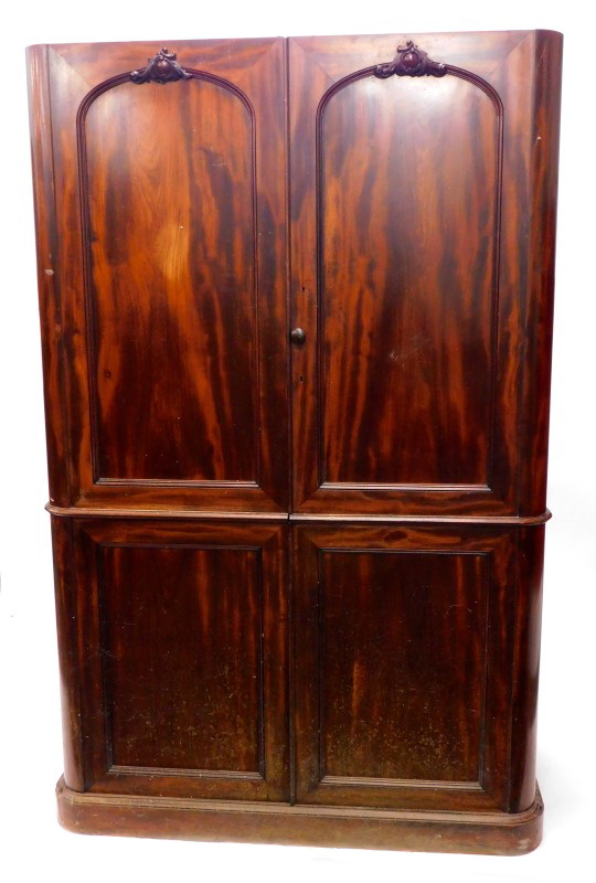 A Victorian mahogany wardrobe, with two doors, each with four panels on a plinth base, (AF,