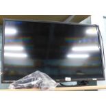 A Technika 31" flat screen television, with lead and remote.