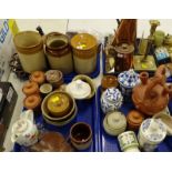 Various stoneware jars, copper flagon, brass candlestick, terracotta vessel, with armorial stamp,