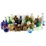 A large quantity of stoneware and glass excavated bottles, various colours, styles, mostly