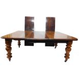 A Victorian mahogany extending dining table, the rectangular top with a moulded edge, on bulbous