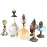 A collection of lighting, to include two column oil lamps, continental clock, etc. (6)