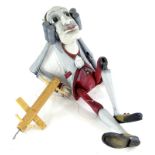 A Czech carved wooden puppet or Marionette, in the form of a gentleman in 18thC dress, with stylised