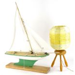 A Star Pond yacht, later painted in green and cream, and a 1960's/70's beech and elm turned table
