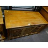 A panelled pine blanket box, 96cm wide.