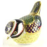 A Royal Crown Derby porcelain paperweight, modelled in the form of a Blue Tit, picked out in gilt,