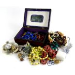 A quantity of costume jewellery, to include necklaces, brooches, a silver plated pocket watch,