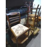 A continental oak dining chair, a small bentwood coat stand, occasional table, fireside chair,
