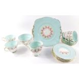 A Paragon porcelain tea service, decorated with flowers against a turquoise ground, pattern no.