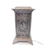 An Omega late 19thC cast iron heater, patent no 22153., of square form, cast with a bear and