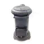 A Chattan cast iron wood burning stove, of cylindrical form, 53cm high, 29.5cm diameter.