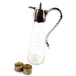 An early 20thC cut glass and silver plated mounted claret jug, of tapering outswept form, 31cm