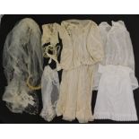 Vintage costume, including a 1930's ivory wedding dress, net veil and train, with floral headband,