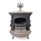 A Charles Fawcett late 19thC cast iron Evening Star wood stove, No 20., Sackfille, New Brunswick,
