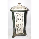 A French early 20thC cast iron and enamel conservatory heater, of canted square form with pierced