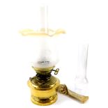 A Messenger Annular brass oil lamp, No 64C, with glass chimney and frosted and etched glass shade,