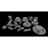 Eight crested china porcelain models of battle ships and other naval craft, crested and