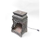 An Oxford late 19thC cast iron and copper heater, with cast foliate scroll decoration, converted