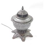 A Victorian cast iron Omega E gas stove converted to a lamp, of circular pierced and semi fluted