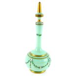 A French late 19thC turquoise glass scent bottle and stopper, of baluster form, enamel decorated