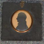 19thC English School. A miniature silhouette portrait of a gentleman, facing left, 71mm high, 63mm