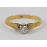 An 18ct gold and diamond solitaire ring, high claw set, approx 1/4ct, size K, 2.1g,
