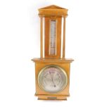 A mid 20thC walnut cased barometer by Negretti & Zambra, London, R/3313, with thermometer, the
