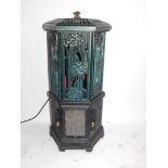 An Esse replica cast iron electric heater, of hexagonal form, with Art Nouveau style floral