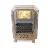 A Victorian cast iron and enamel gas heater by T Fletcher of Warrington, cast with leaves, the