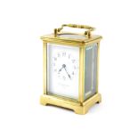 A French late 19thC brass cased carriage clock, by Drayton & Son, Paris, rectangular enamel dial