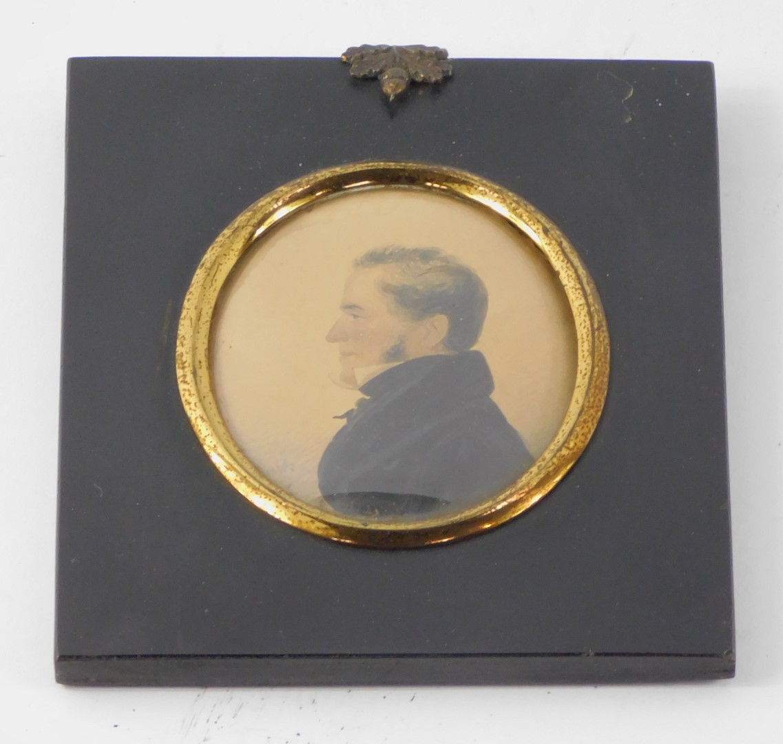 A P Burt (British, Early 19thC). Half length miniature portrait of a gentleman facing left,