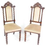 A pair of William & Mary style 19thC mahogany single dining chairs, with foliate carved crest