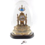 A French late 19thC gilt metal and porcelain mantel clock, the circular dial painted with a rural