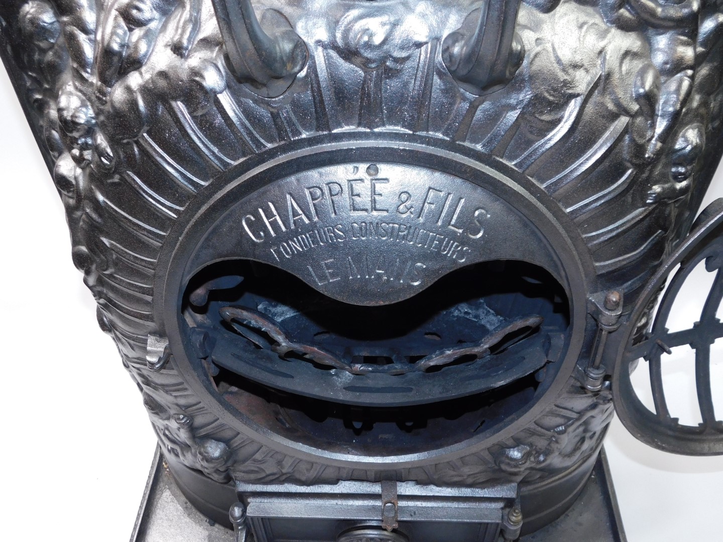 A Chappee & Vils of Le Mans late 19thC cast iron Soleil wood burner, of bow fronted form, - Image 4 of 5