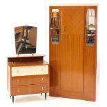 A mid century teak and laminate 'Popular' part bedroom suite, comprising a single door wardrobe,