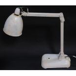 A Memlit vintage industrial desk lamp, later painted white.
