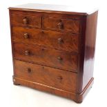 A Victorian mahogany chest, of two short over three long graduated drawers, raised on a bracket