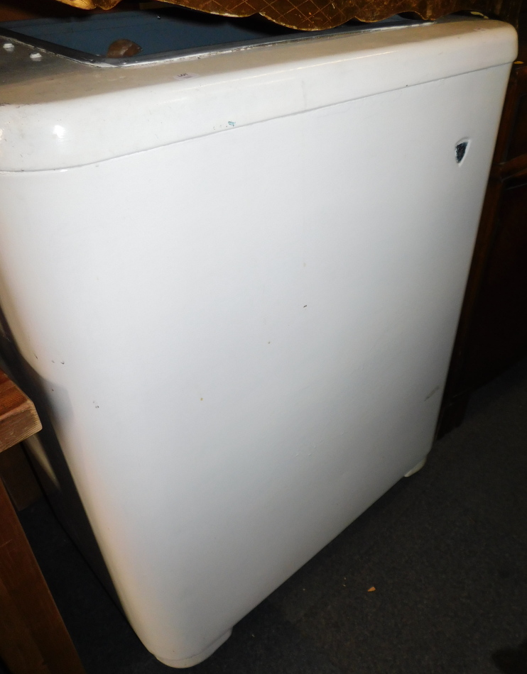 A vintage PSG chest freezer, raised on castors, 102cm high, 83cm wide, 52cm deep.