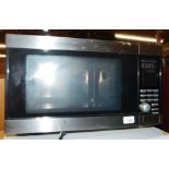 A TCM stainless steel microwave oven, model no 225045.