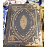 A Victorian gilt tooled and brass bound Holy Bible, with the commentaries of Scott and Henry,