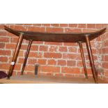 A mid 20thC bent wood coffee table, with cylindrical tapered legs with brass feet, 195cm high,