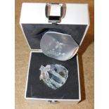 A Swarovski crystal heart ornament, with a frosted tied bow, cased.